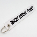 Insert Before Flight Keychain - White