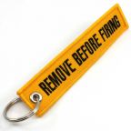 Remove Before Firing Keychain - Yellow/Black